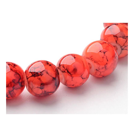 perles orange en verre